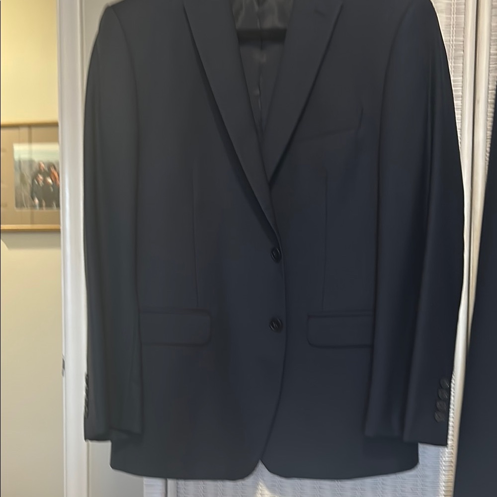 Men’s navy suit. 38s. Dry cleaned.